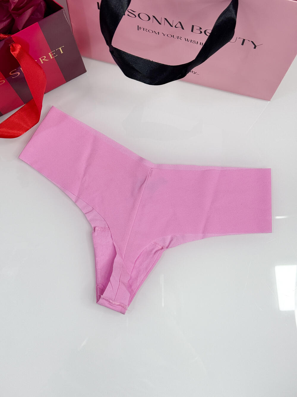 No-Show Thong Panty розмір S рожеві з лого 